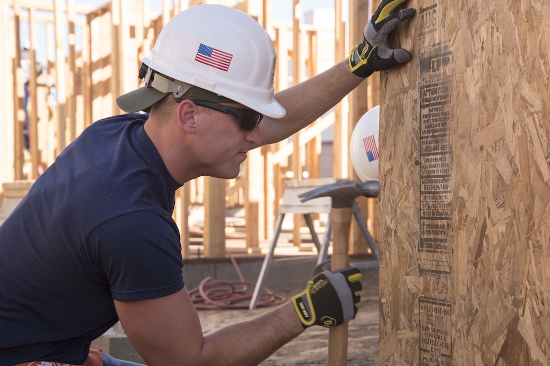 Coast Guardsmen help build homes for Habitat for Humanity in San Pedro, Calif., Nov. 30, 2016. The crews assisted with construction of five duplexes in the Lakewood community.  Coast Guard photo by Petty Officer 3rd Class Andrea Anderson