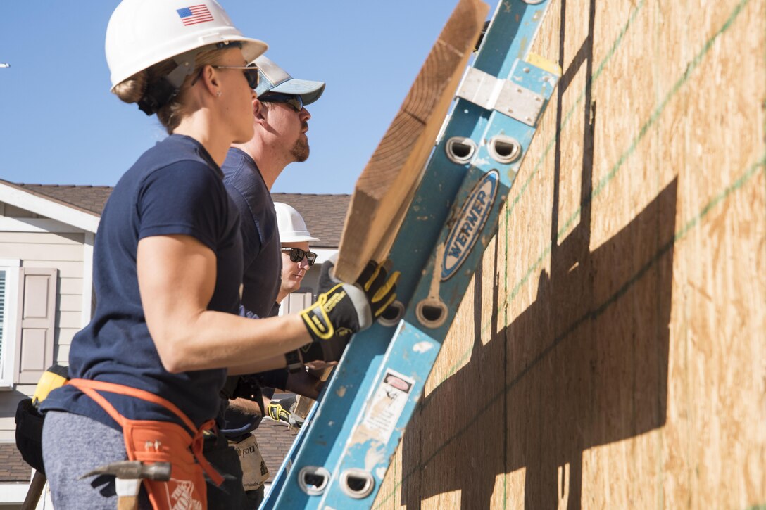 Coast Guardsmen help build homes for Habitat for Humanity in San Pedro, Calif., Nov. 30, 2016. Coast Guard photo by Petty Officer 3rd Class Andrea Anderson