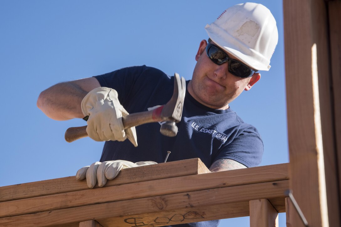 Coast Guardsmen help build homes for Habitat for Humanity in San Pedro, Calif., Nov. 30, 2016. Coast Guard photo by Petty Officer 3rd Class Andrea Anderson