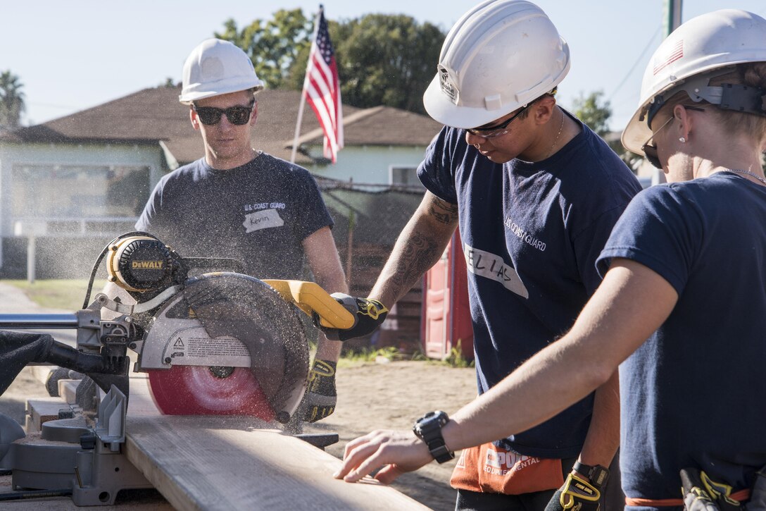 Coast Guardsmen help build homes for Habitat for Humanity in San Pedro, Calif., Nov. 30, 2016. The crews assisted with construction of five duplexes in the Lakewood community.  Coast Guard photo by Petty Officer 3rd Class Andrea Anderson