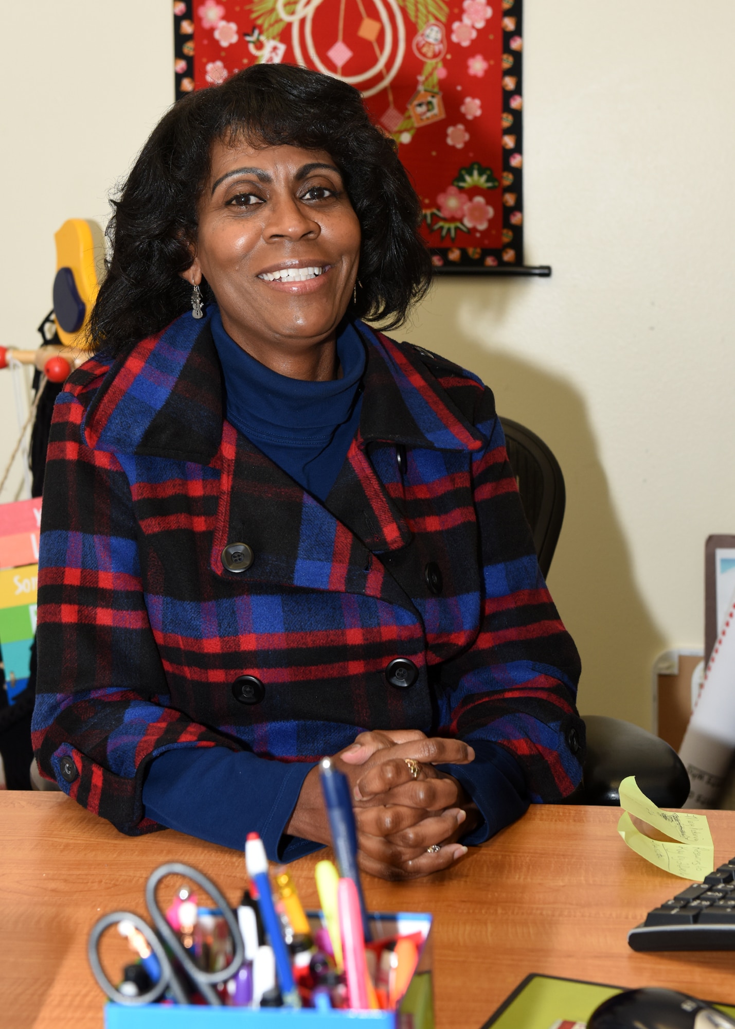 Annette Goodly, Airman and Family Readiness Center school liaison officer, poses for a photo Dec. 1, 2016, at Beale Air Force Base, California. (U.S. Air Force photo/ Senior Airman Ramon A. Adelan)