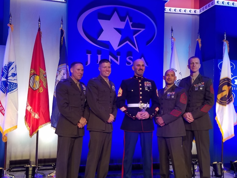 Photo 20161129_214105 from left to right: Col Todd J.
 Oneto, Commanding Officer, Headquarters and Service Battalion, Marine Corps
 Base Quantico; Capt Robert M. Altman, Commanding Officer, Service Company;
 GySgt Craig J. Wilcox (recipient), Company Gunnery Sergeant, Service
 Company; 1stSgt Juan A. Abrego, Company First Sergeant, Service Company;
SgtMaj Thomas L. Johnson, Battalion Sergeant Major, Headquarters and Service
 Battalion.
29 November 2016, Gunnery Sergeant Craig J. Wilcox was awarded
 the Grateful Nation Award. It is one of the Marine Corps "Outreach" Awards.
 Each branch of service was allotted one recipient. GySgt Wilcox was the
 Headquarters and Service Battalion nomination and he was selected to receive
 the award. They read a brief citation noting a few of the many incredible
 things GySgt Wilcox has done in his time.


