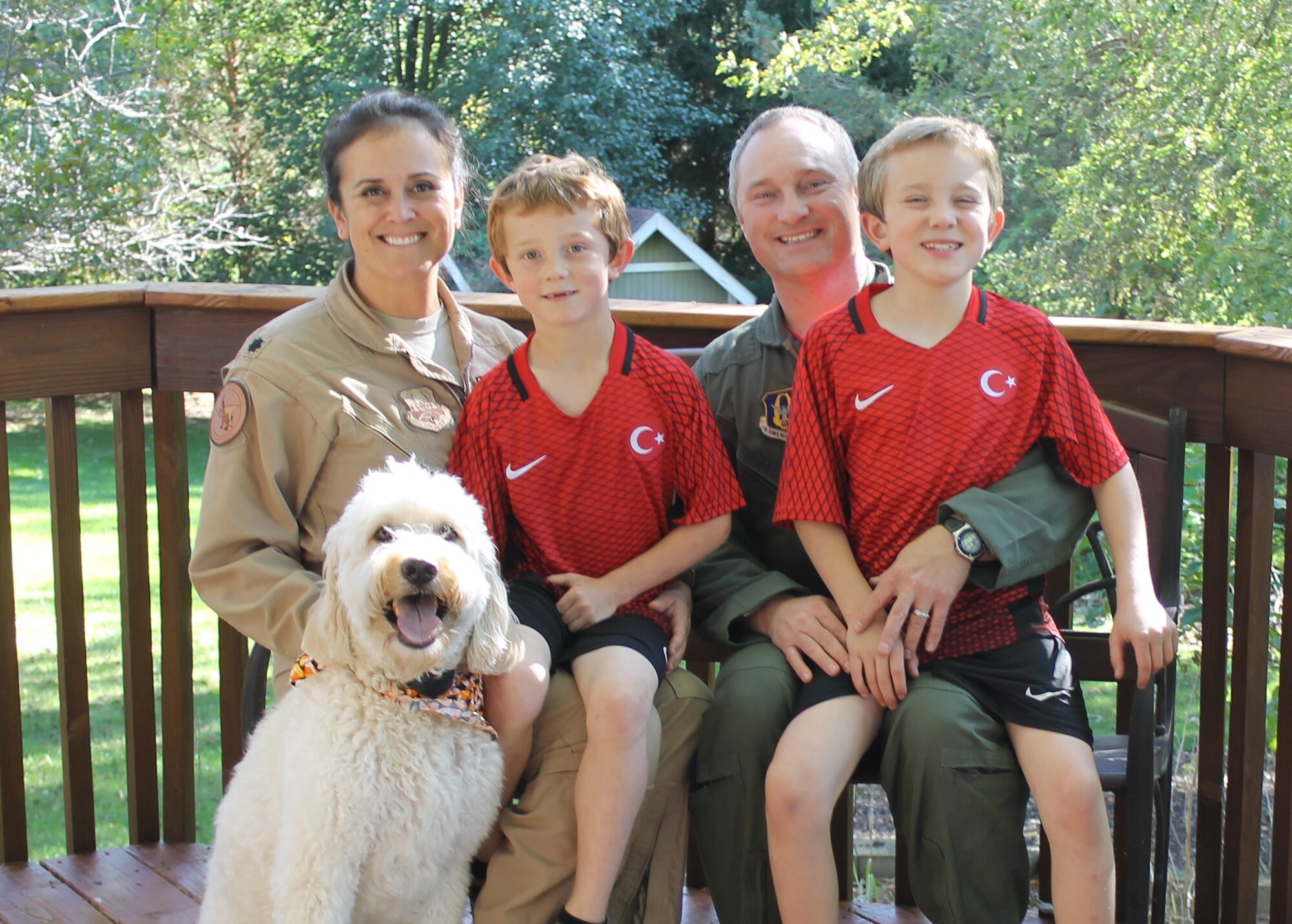 Shown at home, Lt. Cols. Shelby and Matthew Basler, KC-135R Stratotanker pilots with the 434th Air Refueling Wing at Grissom Air Reserve Base, Indiana, attended an Air Force Reserve Yellow Ribbon Reintegration Program training event Nov. 18-20 in Florida with their sons John (l) and Luke. Unable to attend was their dog, Atis, whose name is derived from the aviation term Automatic Terminal Information Service. (Courtesy photo)