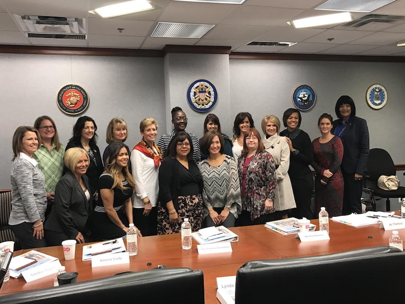 Ellyn Dunford, wife of Marine Corps Gen. Joe Dunford, chairman of the Joint Chiefs of Staff, middle-left with red scarf, met with the spouses of the most-senior enlisted members of the military at the Pentagon, Nov. 30, 2016. Dunford offered advice to the spouses balancing their marriage, children, careers and more. Air Force photo by Tech. Sgt. Amber R. Kelly-Herard