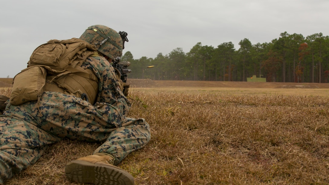 Lance Cpl. John Knobloch engages a target during a fire and maneuver range at Camp Lejeune, N.C., Nov. 29, 2016. The range was held in order to sharpen the fundamentals of the Marines and increase combat readiness. Knobloch is a rifleman with 1st Battalion, 8th Marine Regiment.