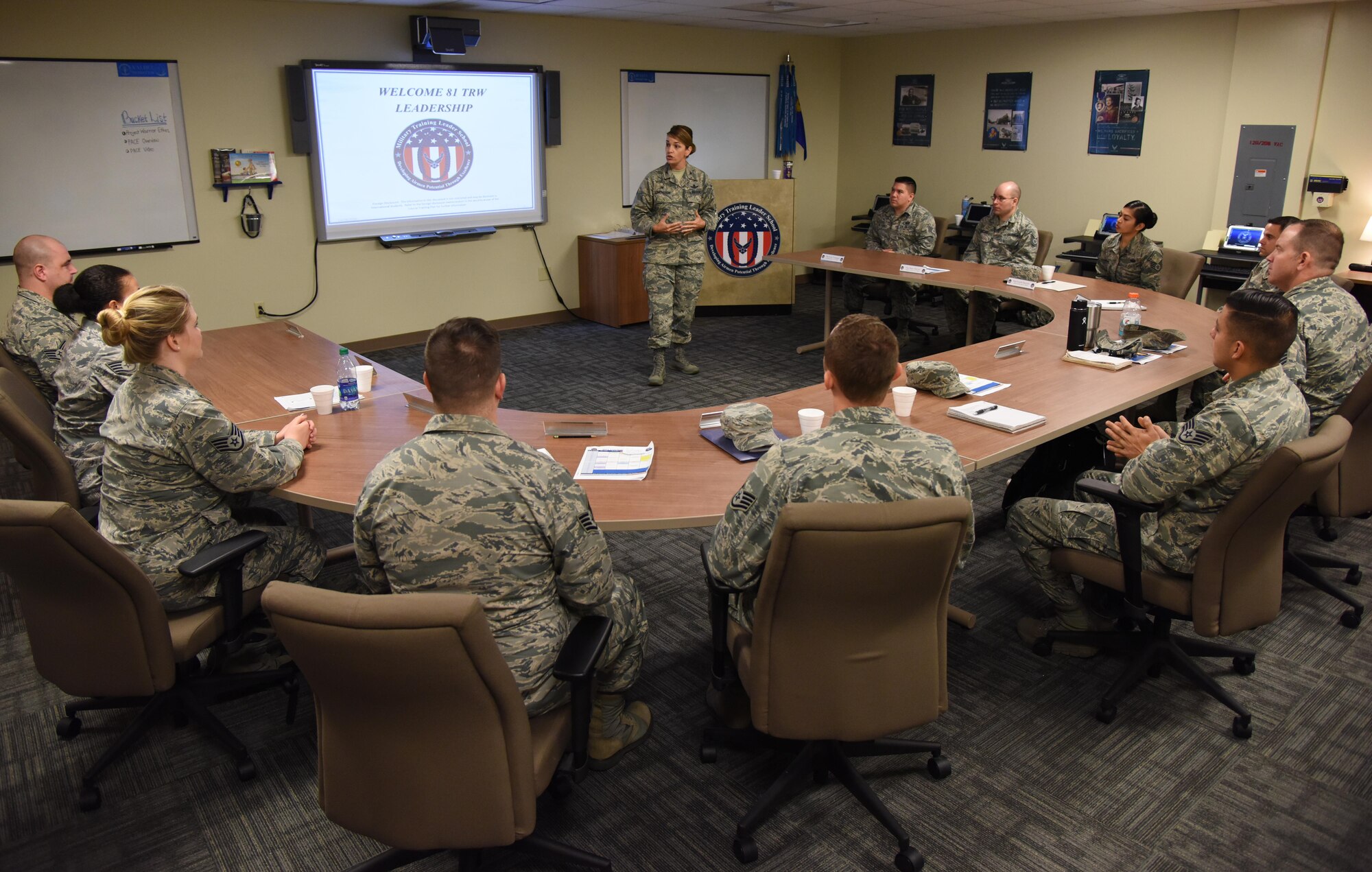 Col. Michele Edmondson, 81st Training Wing commander, delivers welcoming remarks to 81st Training Support Squadron Military Training Leader Course students at Allee Hall Nov. 29, 2016, on Keesler Air Force Base, Miss. This is the second class to attend the schoolhouse’s new four-week course curriculum, which was upped from two weeks and boasts a higher level of hands-on, practical application than its previous format. (U.S. Air Force photo by Kemberly Groue)