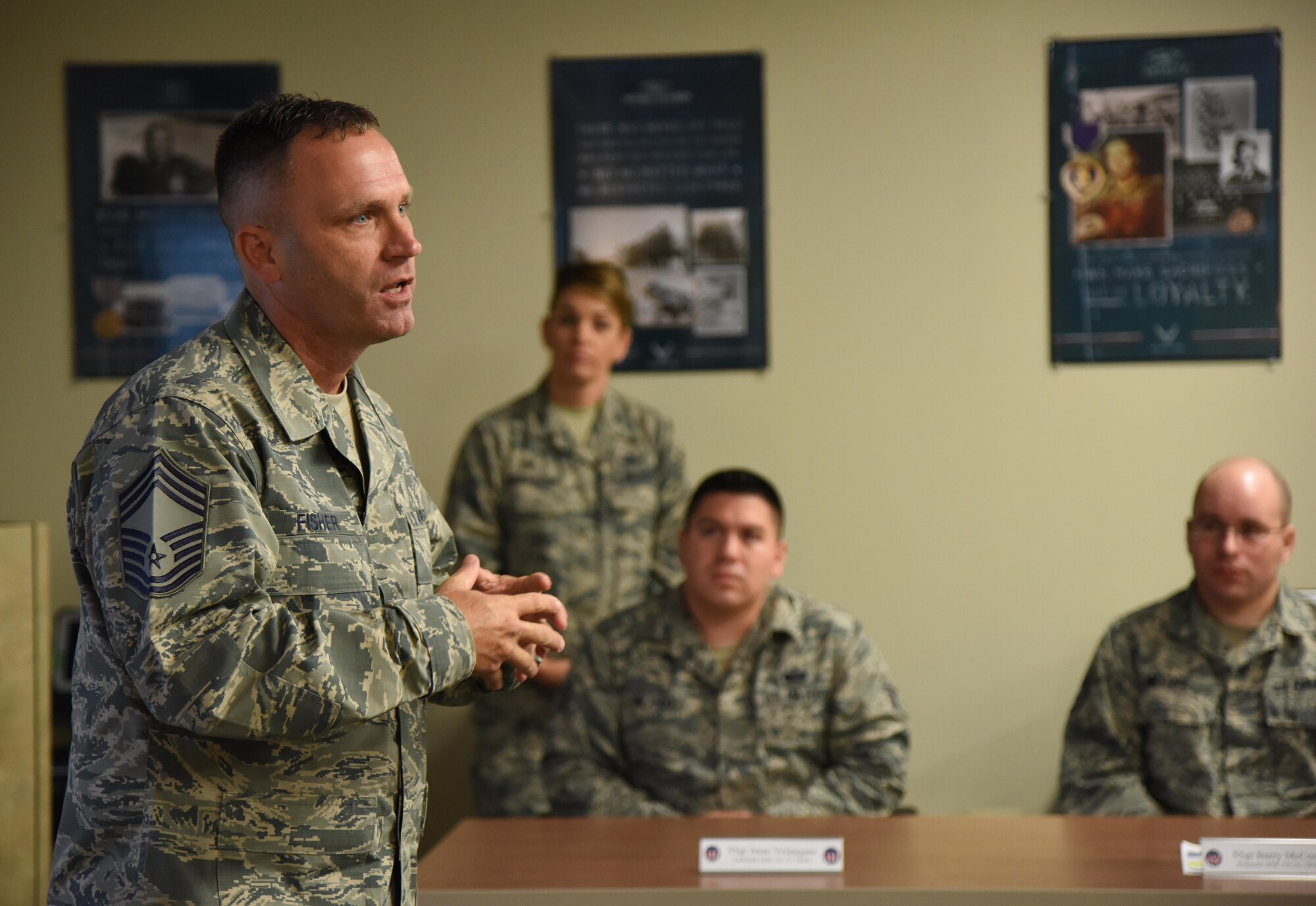 Chief Master Sgt. Anthony Fisher, 81st Training Group superintendent, delivers welcoming remarks to 81st Training Support Squadron Military Training Leader Course students at Allee Hall Nov. 29, 2016, on Keesler Air Force Base, Miss. This is the second class to attend the schoolhouse’s new four-week course curriculum, which was upped from two weeks and boasts a higher level of hands-on, practical application than its previous format. (U.S. Air Force photo by Kemberly Groue)