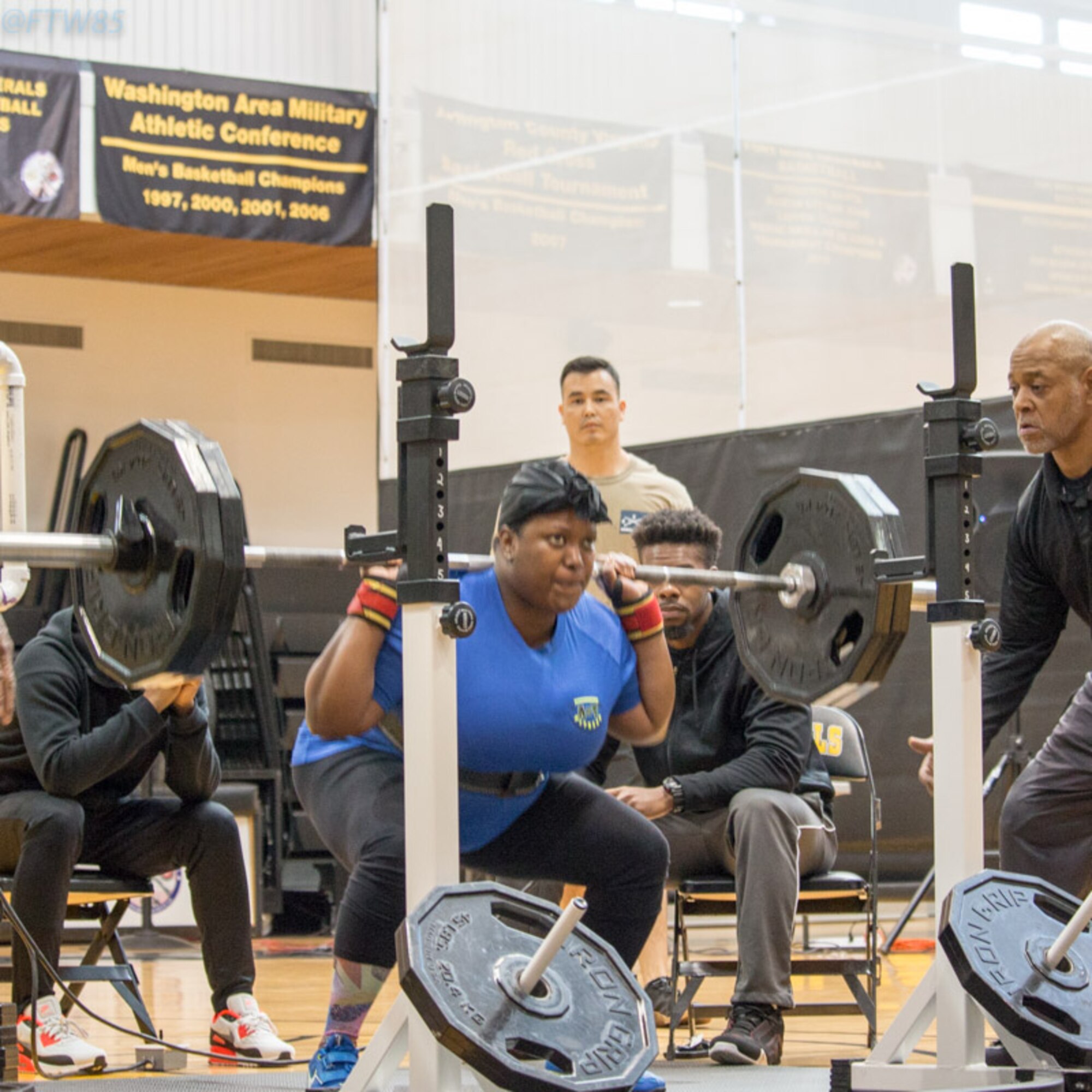 Tech. Sgt. Natasha Fenton focuses on attempting a clean squat at the Joint Base Myer-Henderson Hall Inaugural Powerlifting Meet Oct. 29, 2016. (Courtesy photo) 