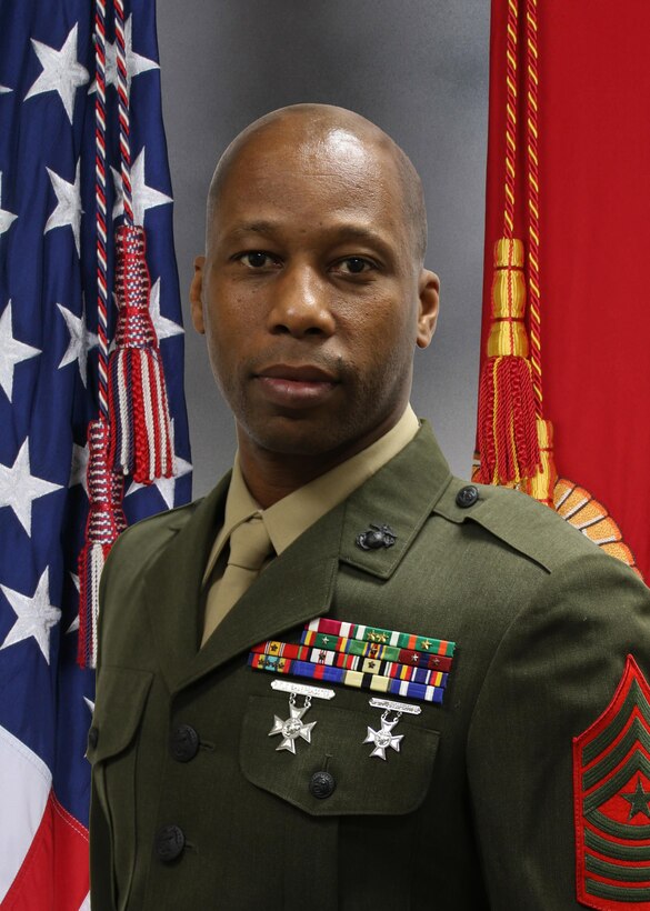 Sergeant Major Chester Wilson III enlisted in the Marine Corps in Columbia, South Carolina July 1992. Upon completing Recruit Training at MCRD Parris Island, South Carolina, he attended Marine Combat Training at Camp Geiger in Jacksonville, North Carolina. Later, he attended his Primary Military Occupational Specialty School in Albany, Georgia where he was assigned the MOS of 3052, Packaging Specialist. PFC Wilson was promoted to the rank of Lance Corporal just prior to leaving this school.
In April 1994 LCpl Wilson was assigned to 3rd Sup Bn which was located on Camp Kinser in Okinawa, Japan where he was assigned to work in the S-3 as a marksmanship instructor/coach, training assistant, and Color Sergeant. LCpl Wilson was meritoriously promoted in December 1995. After being promoted to Sergeant in January 1997, he received PCS orders. 

May 1997, Sgt Wilson was assigned to MAG-14, MALS-14, RMD, and SSB on MCAS Cherry Point, North Carolina. At this duty station, he assumed the duties as NCOIC of the Supply Shipping Branch. Sgt Wilson also took up the duties of Color Sergeant while attending off duty College courses with Craven Community College. Summer 1999, Sgt Wilson was notified here that he was selected for promotion to SSgt and that he had orders to recruiting duty. He attended recruiting school in October 1999.

January 2000, Sgt Wilson was assigned to Recruiting Station Louisville, KY and Recruiting Substation Cincinnati, Ohio as a canvassing recruiter. Sgt Wilson was promoted on March 2000. While on this assignment, he attended the NCOIC School in Pittsburg, Pennsylvania in February 2002. SSgt Wilson successfully completed the Special Duty Assignment of Recruiting Duty January 2003 and received PCS orders.

January 2003, SSgt Wilson was assigned to 2nd Sup Bn on Camp Lejeune, North Carolina where he served with Headquarters and Service Company and then Material Distribution Company. While serving with 2nd Sup Bn, SSgt Wilson assumed the duties of SNC