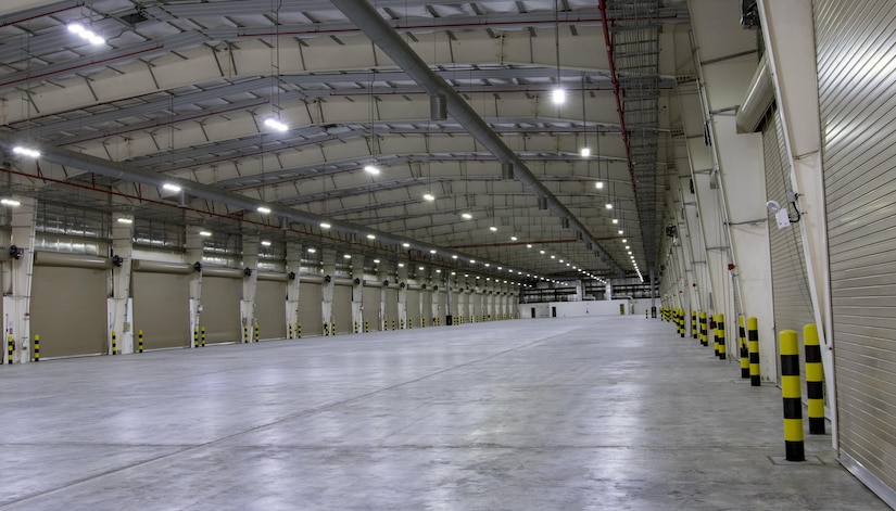 A newly-built warehouse waits to house equipment for the 401st Army Field Support Brigade on Oct. 22, 2016 at Camp Arifjan, Kuwait. This new warehouse will store the 401st AFSB’s prepositioned, combat-ready equipment and material to support unified-land operations all over the U.S. Central Command area of operations.   (U.S. Army photo by Sgt. Angela Lorden)