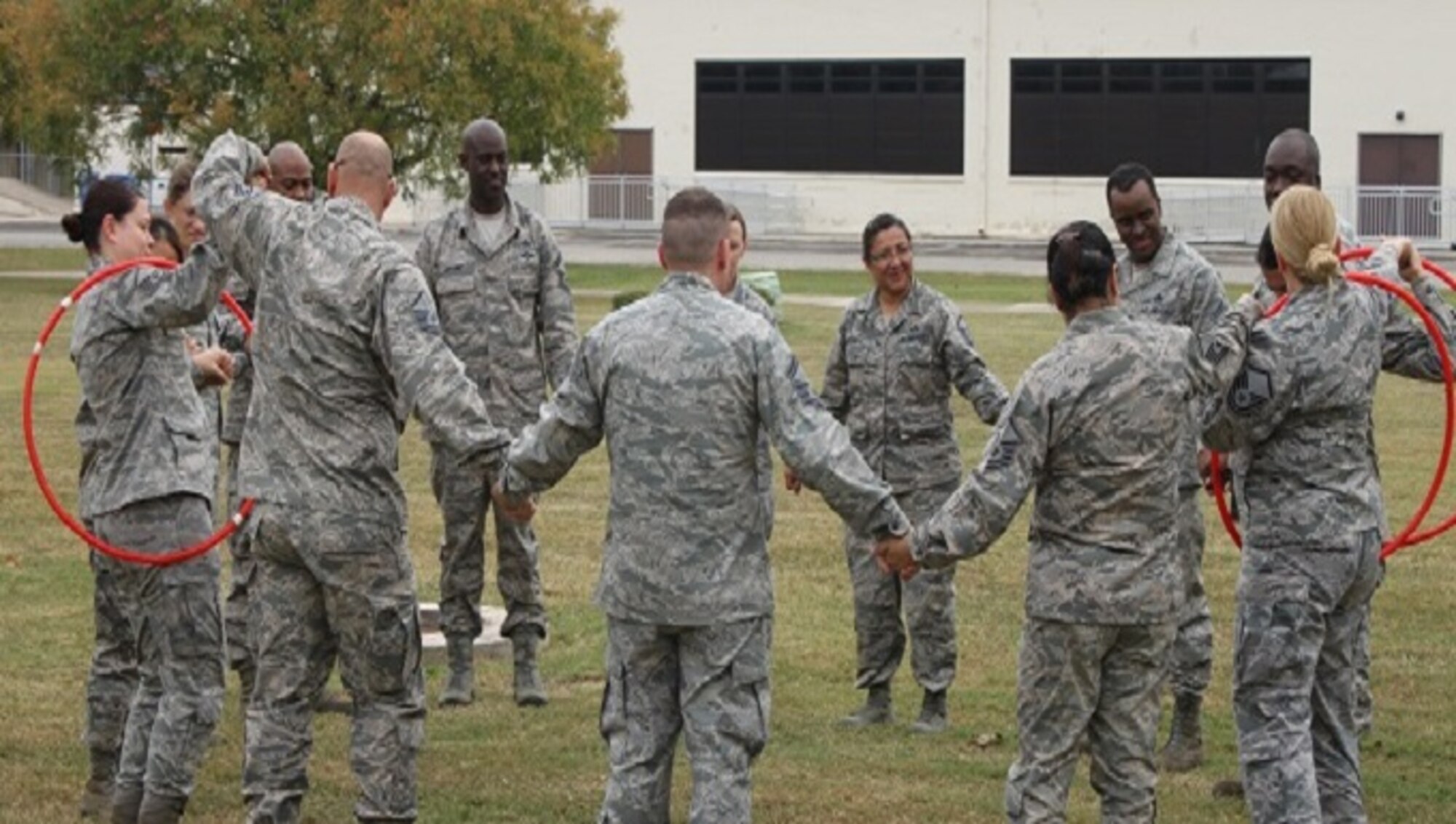 Students perfecting the art of teamwork during one of the team-building exercises in the  Air Force Reserve Command Senior NCO Leadership Development Course, held at Joint Base San Antonio, Texas, on Nov. 4-5, . 
