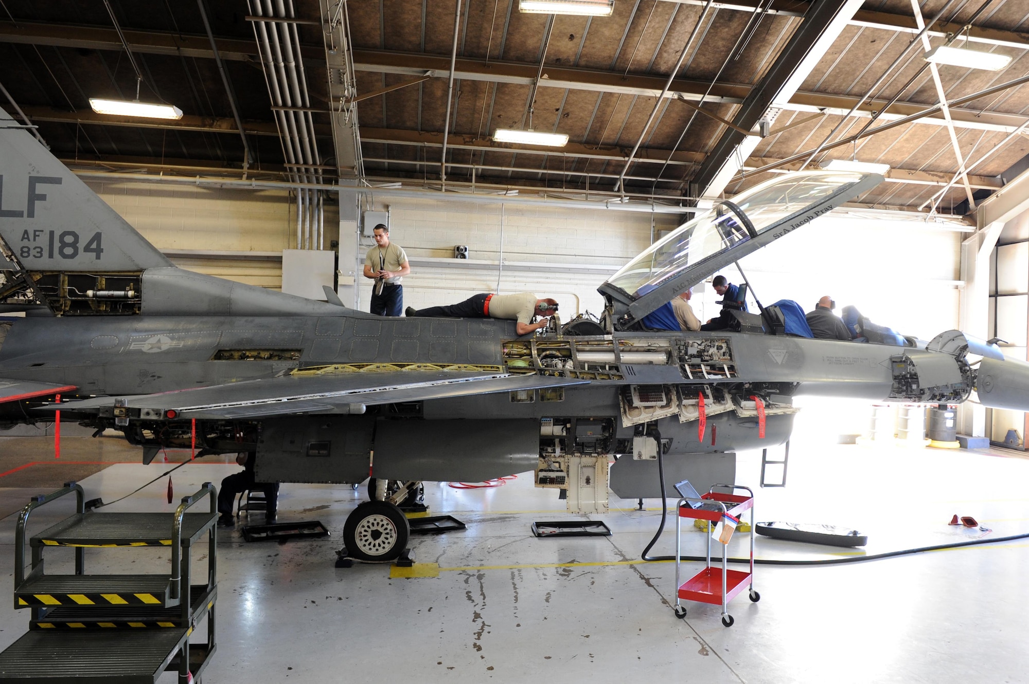Airmen from the 56th Equipment Maintenance Squadron phase shop perform a thorough inspection on an F-16 Fighting Falcon Nov. 23, 2016 at Luke Air Force Base, Ariz. Airmen maintain and validate the structural integrity of the aircraft on a routine basis. (U.S. Air Force photo by Airman 1st Class Pedro Mota)  