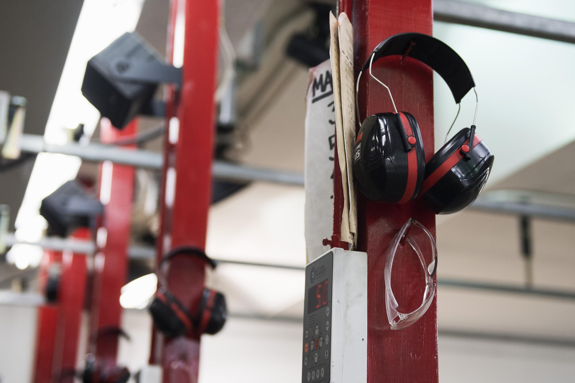 Combat Arms Training and Maintenance course individual protective equipment hangs during a weapons qualification test at Yokota Air Base, Japan, Dec. 1. 2016. To meet minimum qualifications in order to pass the course, Airmen must demonstrate full knowledge of safety rules, procedures and characteristics of multiple weapons and types of ammunition, while also showing target accuracy firing the weapon. (U.S. Air Force photo by Senior Airman Delano Scott/Released)