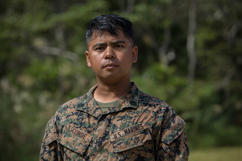 Staff Sgt. Ismael Esconde wanted to make a difference during his six-month unit deployment program to Okinawa, Japan with Headquarters and Service Company, 3rd Battalion, 3rd Marine Regiment as the substance abuse control officer. He heard about the Legend of 1,000 Cranes and thought it would be a good way to show respect to the hospitals and nursing homes to which he gifted them. Esconde is from Los Angeles, California. (U.S. Marine Corps photo by Lance Cpl. Kelsey Dornfeld/Released)