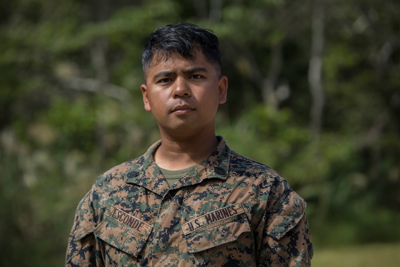 Staff Sgt. Ismael Esconde wanted to make a difference during his six-month unit deployment program to Okinawa, Japan with Headquarters and Service Company, 3rd Battalion, 3rd Marine Regiment as the substance abuse control officer. He heard about the Legend of 1,000 Cranes and thought it would be a good way to show respect to the hospitals and nursing homes to which he gifted them. Esconde is from Los Angeles, California. (U.S. Marine Corps photo by Lance Cpl. Kelsey Dornfeld/Released)