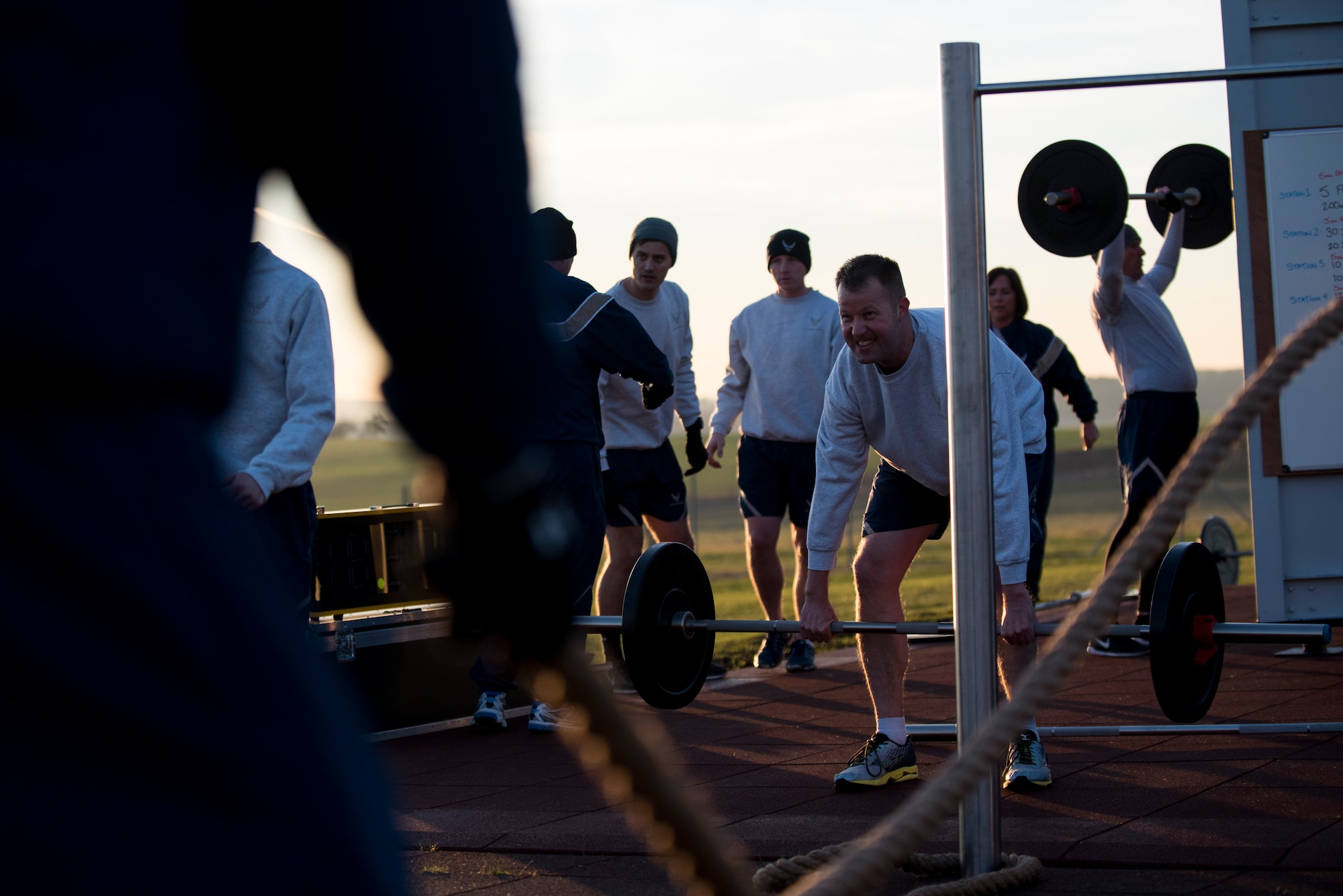U.S. Air Force Command Chief Master Sgt. Edwin Ludwigsen, 52nd Fighter Wing command chief, performs a deadlift exercise using the new Fitness-In-A-Box outside the Powerhaus Fitness Center on Spangdahlem Air Base, Germany, Nov. 30, 2016. The physical training session included wing leadership working out with Fitness-In-A-Box, a lockable unit complete with strength and conditioning training equipment. (U.S. Air Force photo by Airman 1st Class Preston Cherry)