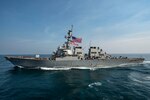 ARABIAN GULF (Nov. 18, 2016) The guided-missile destroyer USS Hopper (DDG 70) makes a breakaway following a replenishment-at-sea with the fast combat support ship USNS Arctic (T-AOE 8). Arctic is deployed supporting coalition maritime forces ships in the U.S. 5th Fleet area of operations. (U.S. Navy photo by Petty Officer 3rd Class Cole Keller)
