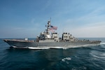 ARABIAN GULF (Nov. 18, 2016) The guided-missile destroyer USS Hopper (DDG 70) makes a breakaway following a replenishment-at-sea with the fast combat support ship USNS Arctic (T-AOE 8). Arctic is deployed supporting coalition maritime forces ships in the U.S. 5th Fleet area of operations. (U.S. Navy photo by Petty Officer 3rd Class Cole Keller)
