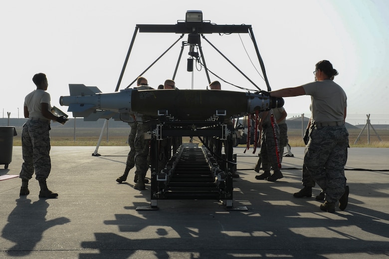 Airmen assigned to the 447th Expeditionary Aircraft Maintenance Squadron inspect completed GBU-54 Laser Joint Direct Attack Munition bombs Oct. 29, 2016, at Incirlik Air Base, Turkey. The bombs are inspected for operability before being loaded onto aircraft or placed in a storage area. (U.S. Air Force photo by Airman 1st Class Devin M. Rumbaugh)