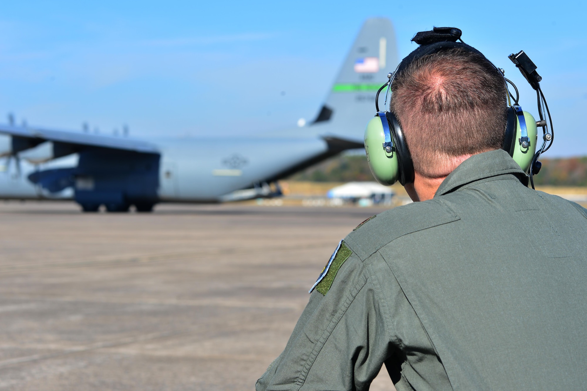 U.S. Air Force Maj. Scott Branco, 314th Operations Group chief of weapons and tactics, oversees the preparation of a C-130J for the Turkey Shoot competition Nov. 17, 2016, at Little Rock Air Force Base, Ark. Airmen from the 19th Airlift Wing, 314th Airlift Wing, 189th Airlift Wing and 913th Airlift Group squared off, testing their airdrop expertise during the competition. (U.S. Air Force photo by Airman 1st Class Grace Nichols)