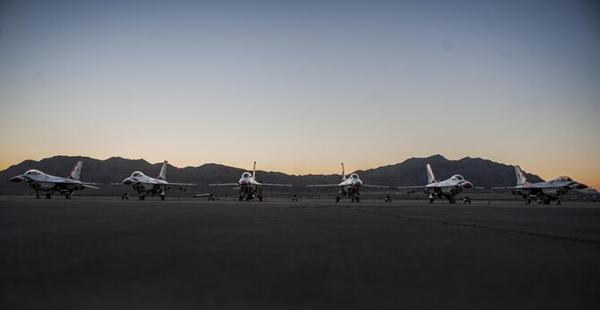 The Thunderbirds’ F-16 Fighting Falcons sit on the flightline at Nellis Air Force Base, Nev., before Aviation Nation, Nov. 11, 2016. The Thunderbirds demonstrate the capabilities of the Air Force and the decisive combat power Airmen bring to threats against the U.S. (U.S. Air Force photo/Airman 1st Class Kevin Tanenbaum)
