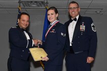 U.S. Air Force Reserve Col. Anthony Brusca, interim commander for the 913th Airlift Group, Senior Airman Alexandria Erwin, 96 Aerial Port Squadron, and Chief Master Sgt. Ralph Babcock, superintendent, 913th Aircraft Maintenance Squadron, pose for a photo during the Airman Leadership School graduation ceremony Dec. 1, 2016, at Little Rock Air Force Base, Ark. ALS is an Air Force education program held at base level that teaches leadership skills required of supervisors, while strengthening the ability to lead, follow, and manage, which are qualities needed for positions of greater responsibility. (U.S. Air Force photo by Airman 1st Class Kevin Sommer Giron)