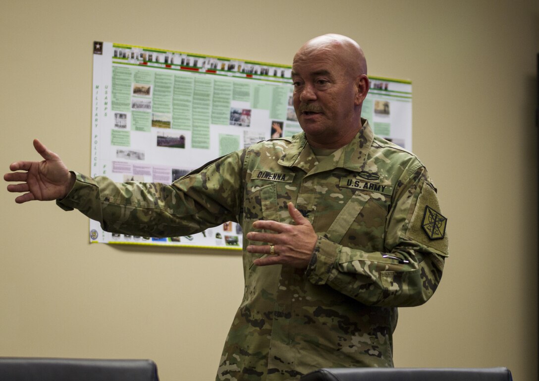 Col. David Dinenna, the chief of operations for 200th Military Police Command, briefs Brig. Gen. Byung Ho Choi, provost marshal for the Republic of Korea Army, at Fort Meade, Maryland, Nov. 30. The briefing assessed how Military Police assets of the U.S. Army Reserve, such as the 200th MP Command, operate so that the Republic of Korea can incorporate M.P.'s in their own reserve army. This process benefits the U.S. strategically and tactically by creating interoperability, enhancing security and decreasing dependence on U.S. Forces. (U.S. Army Reserve photo by Sgt. Audrey Hayes)