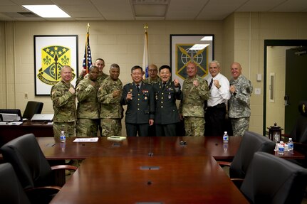 Brig. Gen. Byung Ho Choi, provost marshal for the Republic of Korea Army (center), visited the 200th Military Police Command to receive a briefing at Fort Meade, Maryland, Nov. 30. The briefing informed Choi how Military Police assets of the U.S. Army Reserve, such as the 200th MP Command, operate so that the Republic of Korea can incorporate M.P.'s in their own reserve army. This process benefits the U.S. strategically and tactically by creating interoperability, enhancing security and decreasing dependence on U.S. Forces. (U.S. Army Reserve photo by Sgt. Audrey Hayes)