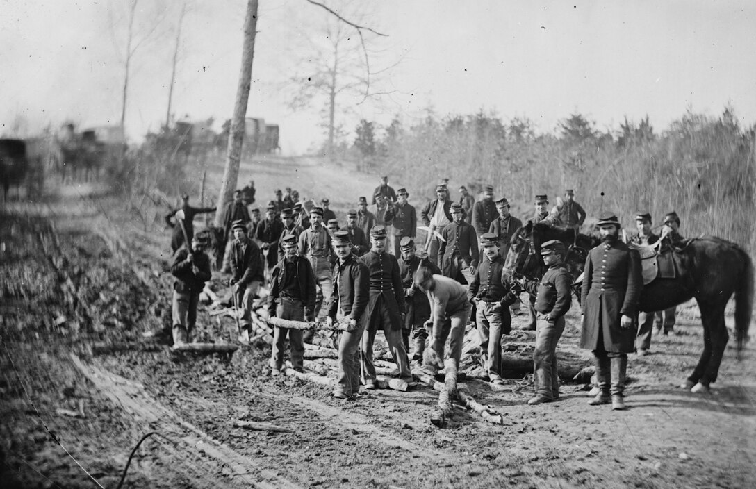 Due to the flooded nature of the countryside and the roads being almost impassable, Union engineers and fatigue parties had to corduroy roads to provide a firm surface for the soldiers to march and the wagons to roll. Here, Union troops construct corduroy roads during the Peninsular Campaign in Virginia.