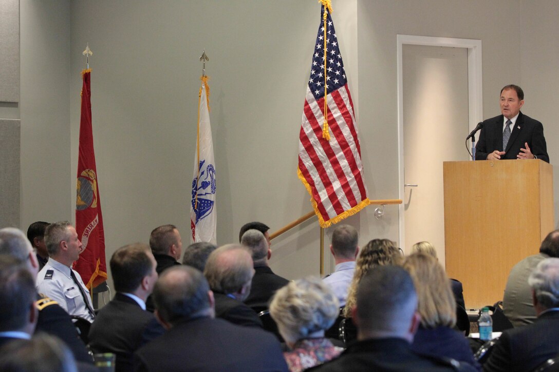 The Utah Governor, Gov. Gary Herbert delivers keynote remarks during the Utah Military Community Support Conference November 18 at the state capital office building.  The conference brings together Utah’s military leaders and community support advocates to advance the common purpose of installation and mission excellence through effective community engagement and support. Program topics included state military affairs, defense economic impacts, senior military unit and mission overviews, a moderated community support panel, and a keynote lunch presentation.