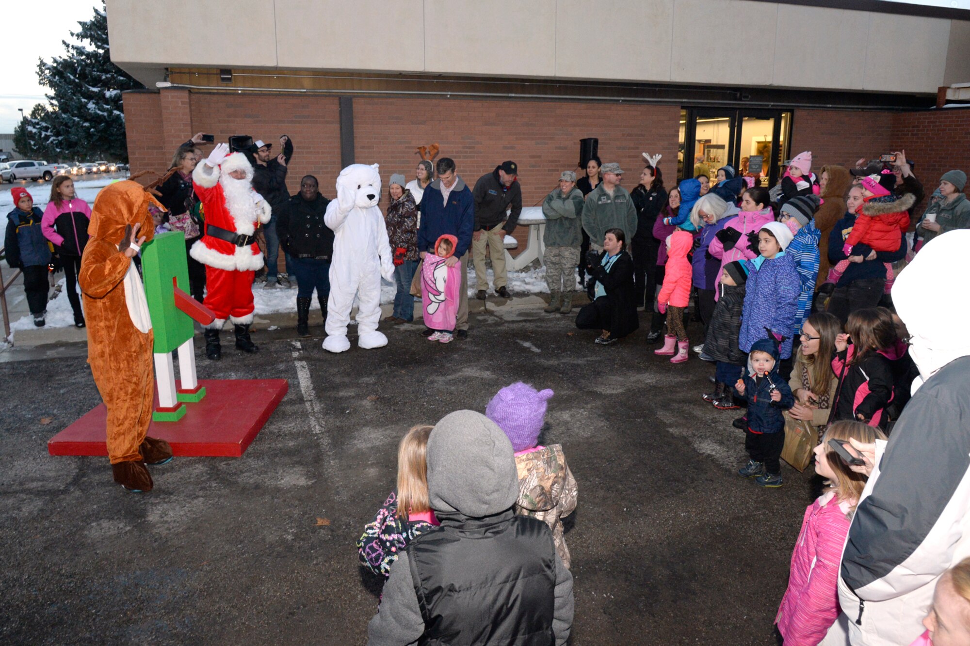 Hill Air Force Base families anticipate the Christmas tree lighting Nov. 30 at the Arts & Crafts Center on base. (U.S. Air Force photo by Todd Cromar)