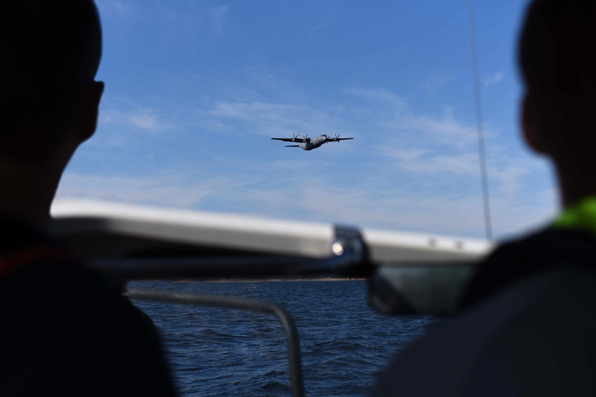 A C-130J assigned to the 19th Airlift Wing locates a capsized row boat on the water as part of a search and rescue excerise during a Turkey Shoot competition Nov. 17, 2016, at Lake Oauchita, Ark. The first objective was to locate the boat, then air drop supplies to the survivors on the water. (U.S. Air Force photo by Airman 1st Class Kevin Sommer Giron)