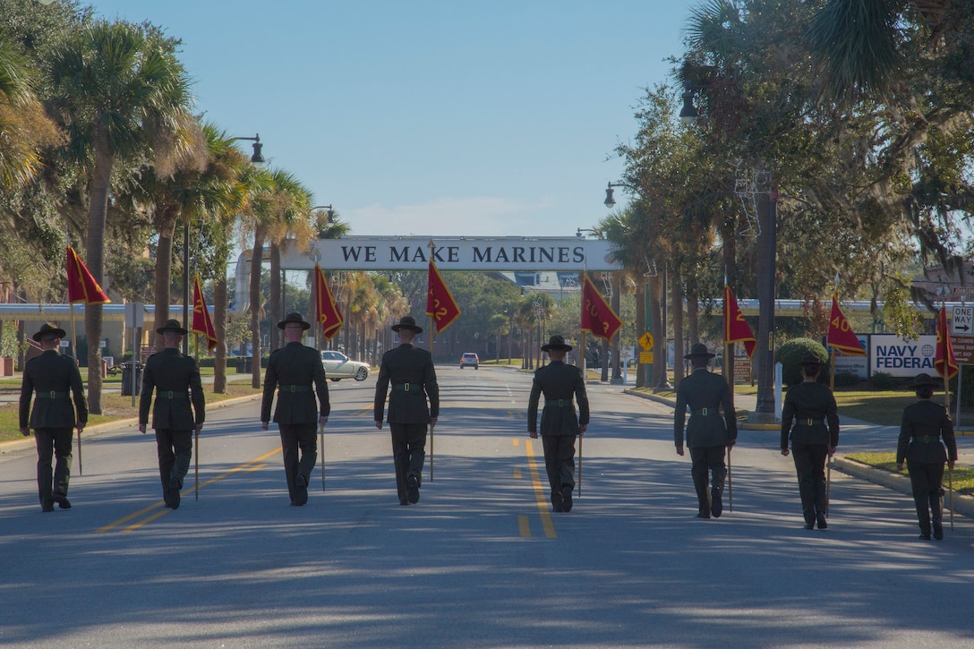 Drill instructors of Echo Company, 2nd Recruit Training Battalion, and Papa Company, 4th Recruit Training Battalion, retire the guidons Dec. 2, 2016. The guidons are retired after each platoon graduates.