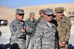 Air Force Gen. Joseph Lengyel, chief, National Guard Bureau, second from right, and Air Force Chief Master Sgt. Mitchell Brush, senior enlisted advisor to the chief of the National Guard Bureau, left, view training in the Hashemite Kingdom of Jordan during a Thanksgiving visit to troops, Nov. 26, 2016. 