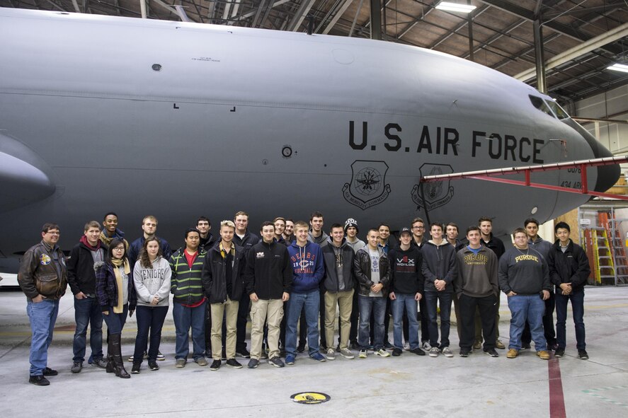 Students from Purdue University, Ind. pose with a 434th Air Refueling Wing KC-135R Stratotanker during a tour at Grissom Air Reserve Base, Ind., Nov. 16, 2016. During the visit, students had an opportunity to speak with aircrew to learn more about Grissom and the careers of the men and women who work here. (U.S. Air Force photo/Tech. Sgt. Benjamin Mota)