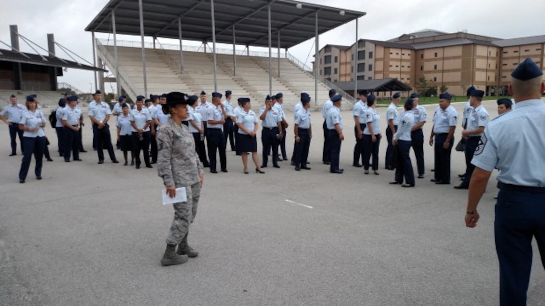 An Air Force Basic Military Training instructor briefs the 2016 AFOSI SNCO PDS Class on a drill pad at Joint Base San Antonio-Lackland, Texas. (Courtesy photo)