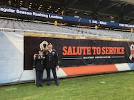 Sgt. 1st Class Susan Torres, left, and Sgt. David Lietz, formerly assigned to the 85th Support Command pause for a photo during the Chicago Bears 'Salute To Service' Veterans Day game at Soldier Field, Nov. 27, 2016. More than 100 service members participated in a on-field flag unfurling to kick off the game there in front of a near 60,000 spectators.
(Courtesy photo) 