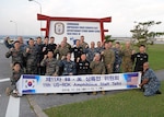 Members of U.S. and Republic of Korea (ROK) staff talks pose for group photo; (from left to right, seated) Col. Seun Gyun Lee, 1st Republic of Korea (ROK) Marine Division, Rear Adm. Marc H. Dalton, commander, Amphibious Force 7th Fleet, Rear Adm. Jong-Sam Kim, Commander, Flotilla 5, Col. Charles Western, 3d Marine Expeditionary Brigade, Nov. 29, 2016. The staff talks between U.S. and ROK armed forces aimed to build on interoperability and on the long-standing alliance between both nations.
