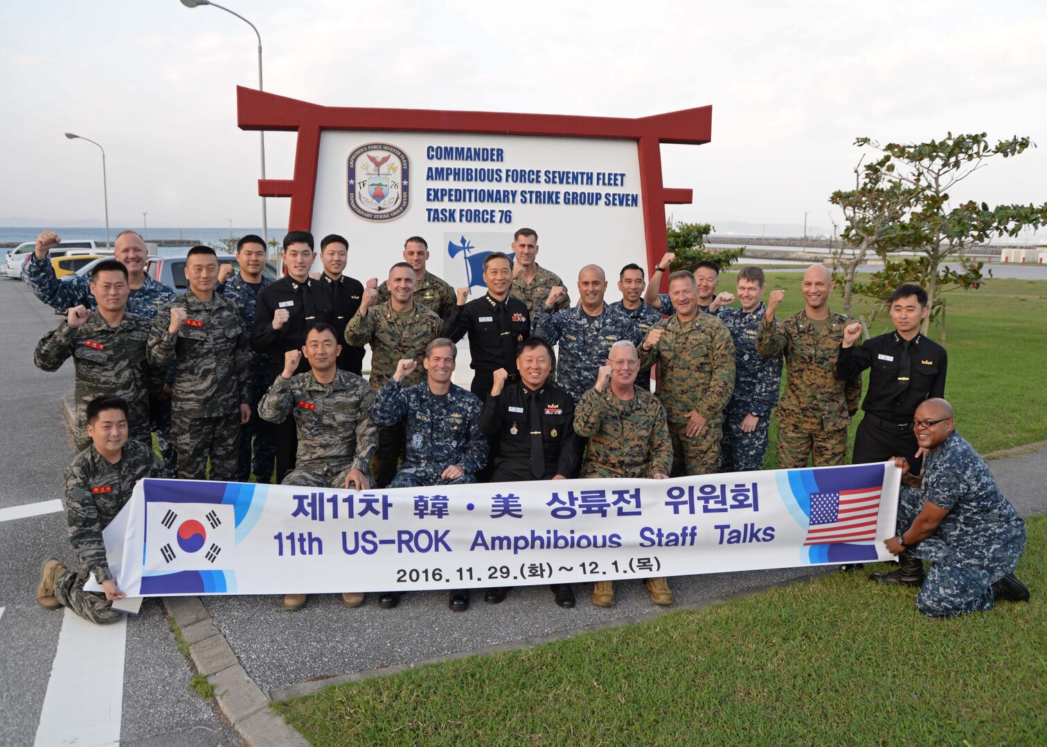 Members of U.S. and Republic of Korea (ROK) staff talks pose for group photo; (from left to right, seated) Col. Seun Gyun Lee, 1st Republic of Korea (ROK) Marine Division, Rear Adm. Marc H. Dalton, commander, Amphibious Force 7th Fleet, Rear Adm. Jong-Sam Kim, Commander, Flotilla 5, Col. Charles Western, 3d Marine Expeditionary Brigade, Nov. 29, 2016. The staff talks between U.S. and ROK armed forces aimed to build on interoperability and on the long-standing alliance between both nations.