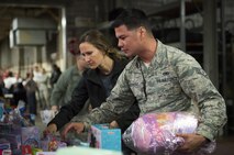 A staff sergeant searches for the perfect gift during the base’s annual toy drive at Eglin Air Force Base, Fla., Dec. 2. Approximately 2,000 toys were collected by donations made throughout the year. Toys, bikes, books, games, crafts, sports equipment and stuffed animals were given to active-military families in need of assistance during the holidays. (U.S. Air Force photo/Samuel King Jr.)