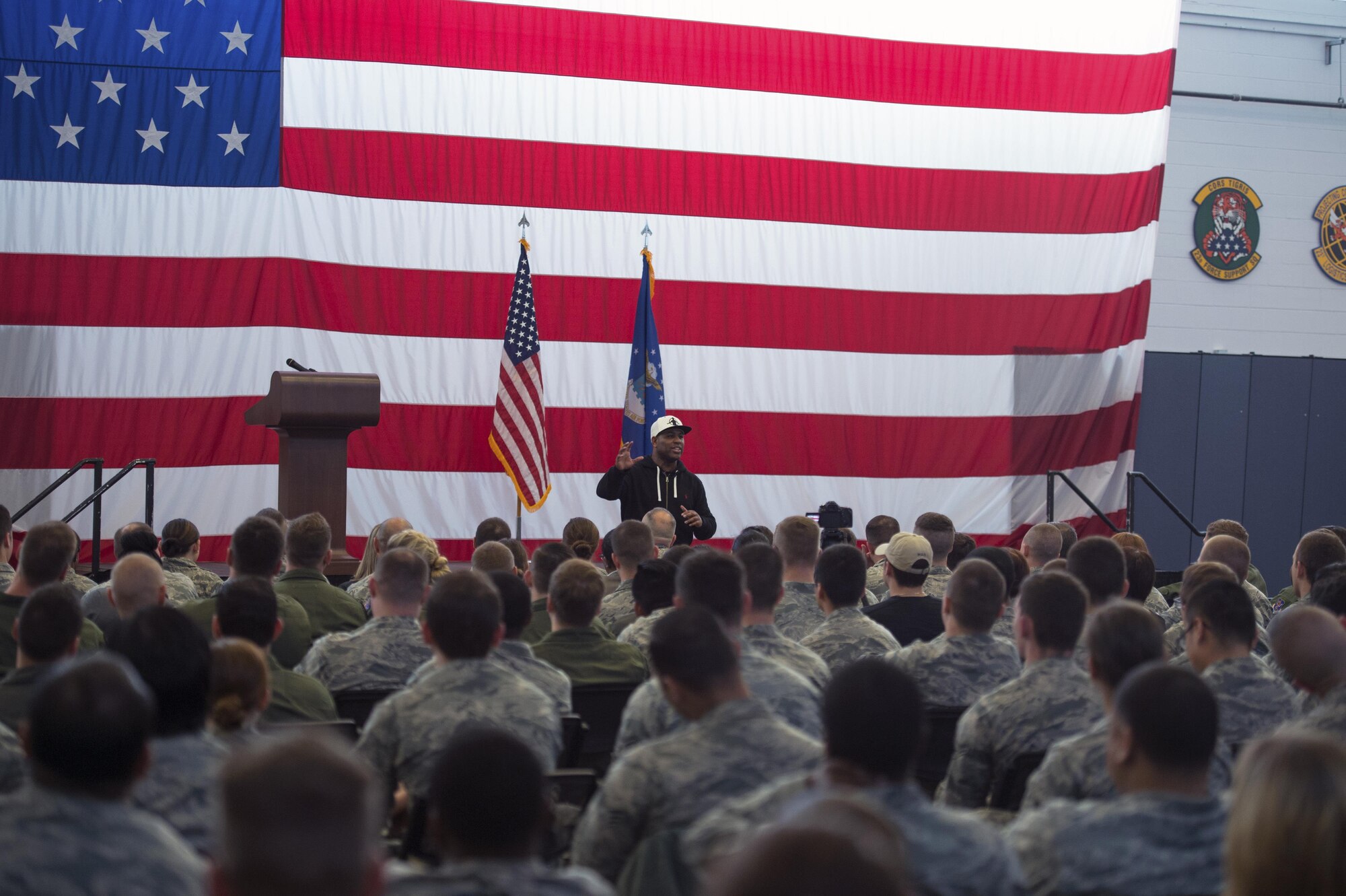 Dr. Eric Thomas, motivational speaker, gives remarks during Comprehensive Airman Fitness day, Dec. 2, 2016, at Moody Air Force Base, Ga. Thomas shared his spiritual fitness journey on how he overcame adversities and how Airmen can do the same. (U.S. Air Force photo by Airman 1st Class Greg Nash)