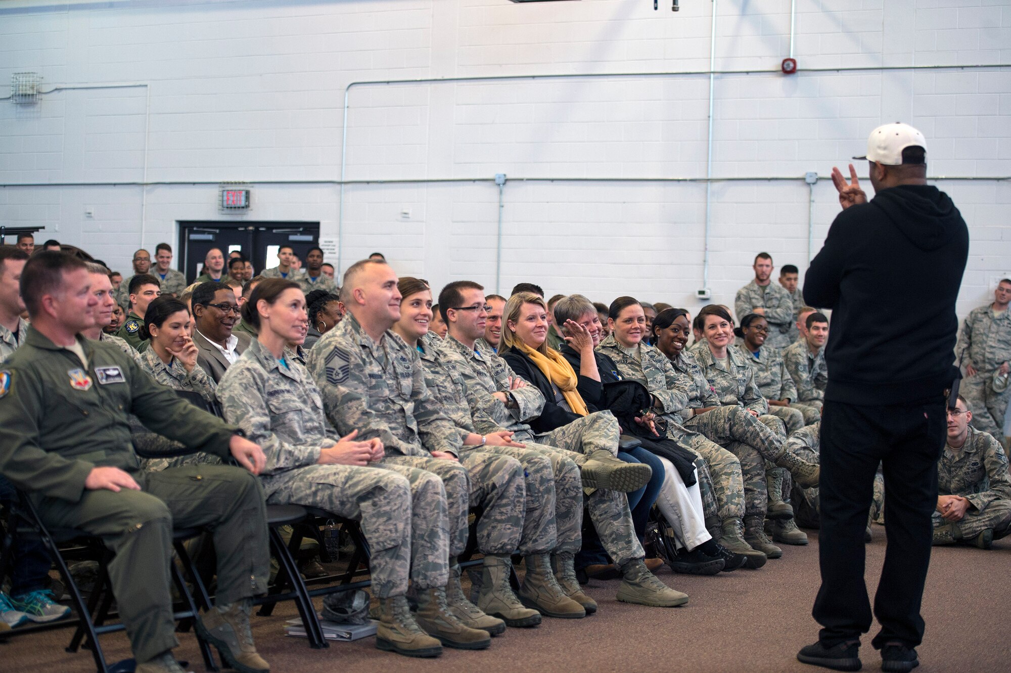 Members of the 23d Wing listen to Dr. Eric Thomas, motivational speaker, while participating in Comprehensive Airman Fitness day, Dec. 2, 2016, at Moody Air Force Base, Ga. Airmen assessed their spiritual wellness to help build resiliency and cope with life’s challenges during the quarterly CAF event. (U.S. Air Force photo by Airman 1st Class Greg Nash)