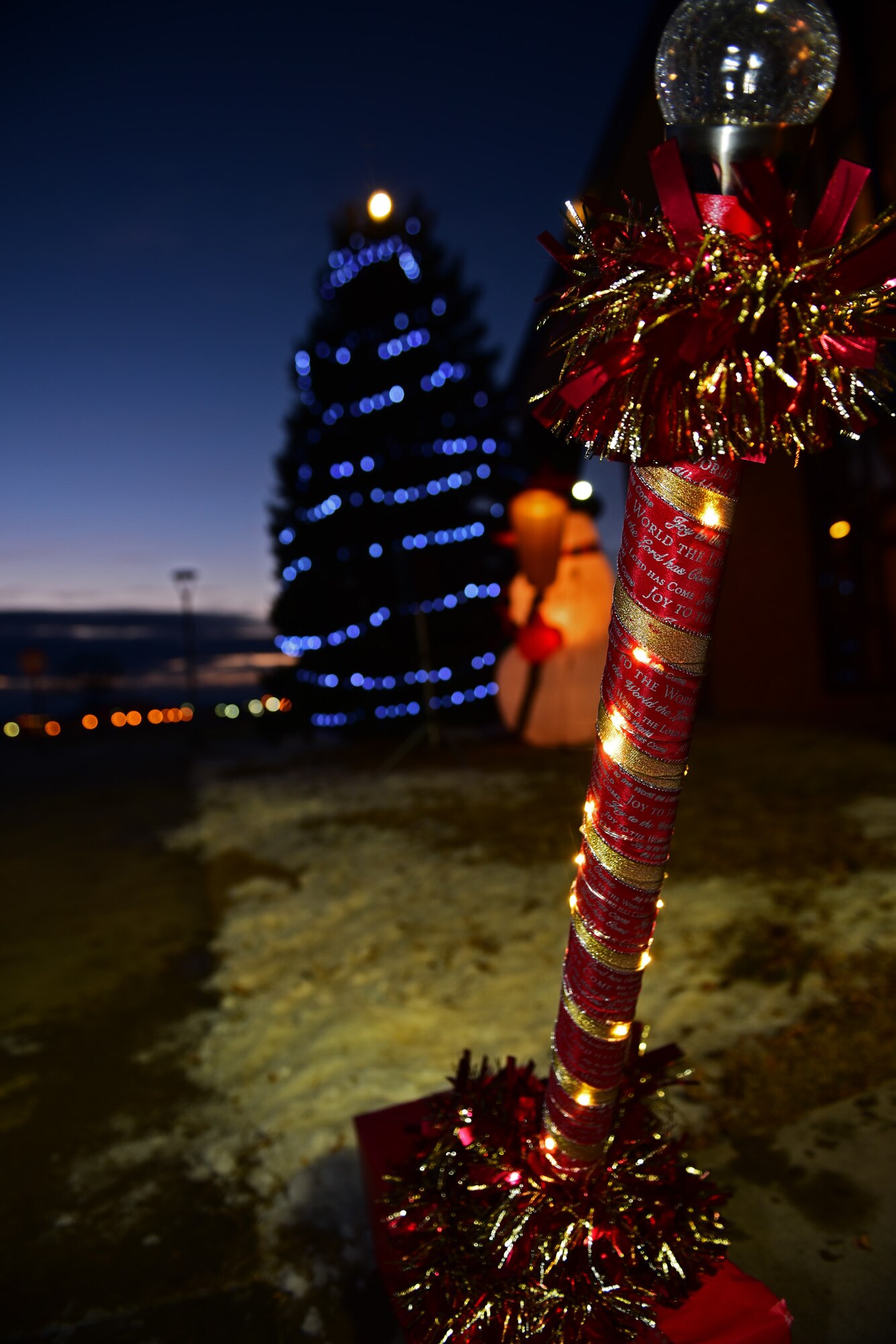 The Freedom Chapel Christmas tree illuminates the night at Ellsworth Air Force Base S.D., Dec. 1, 2016. The lights were switched on by children of deployed Airmen during the 28th Bomb Wing tree lighting ceremony. (U.S. Air Force photo by Airman 1st Class James L. Miller) 