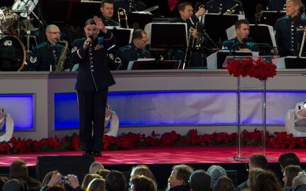 Tech. Sgt. Paige Wroble, the U.S. Air Force Band’s Airmen of Note vocalist, sings during the 2016 National Christmas Tree Lighting Ceremony in Washington, D.C., Dec. 1, 2016. The Airmen played from the start to finish of the ceremony, providing instrumentals to artists like Chance the Rapper, Kelly Clarkson, James Taylor and the Lumineers. (U.S. Air Force photo by Senior Airman Jordyn Fetter)