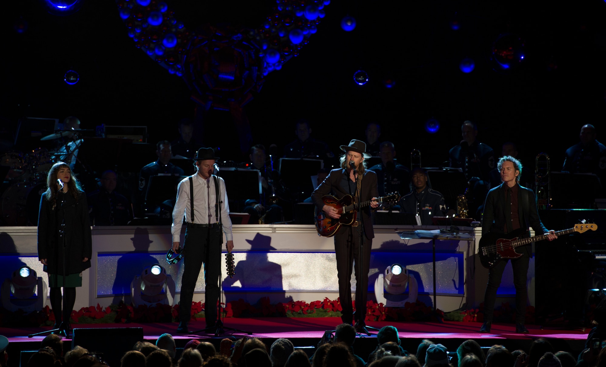 The Lumineers, an American folk rock band, entertain eventgoers during the National Christmas Tree Lighting Ceremony in Washington, D.C., Dec. 1, 2016.  The Airmen of Note, the U.S. Air Force's premier jazz ensemble, provided the musical accompaniment. (U.S. Air Force photo by Senior Airman Jordyn Fetter)
