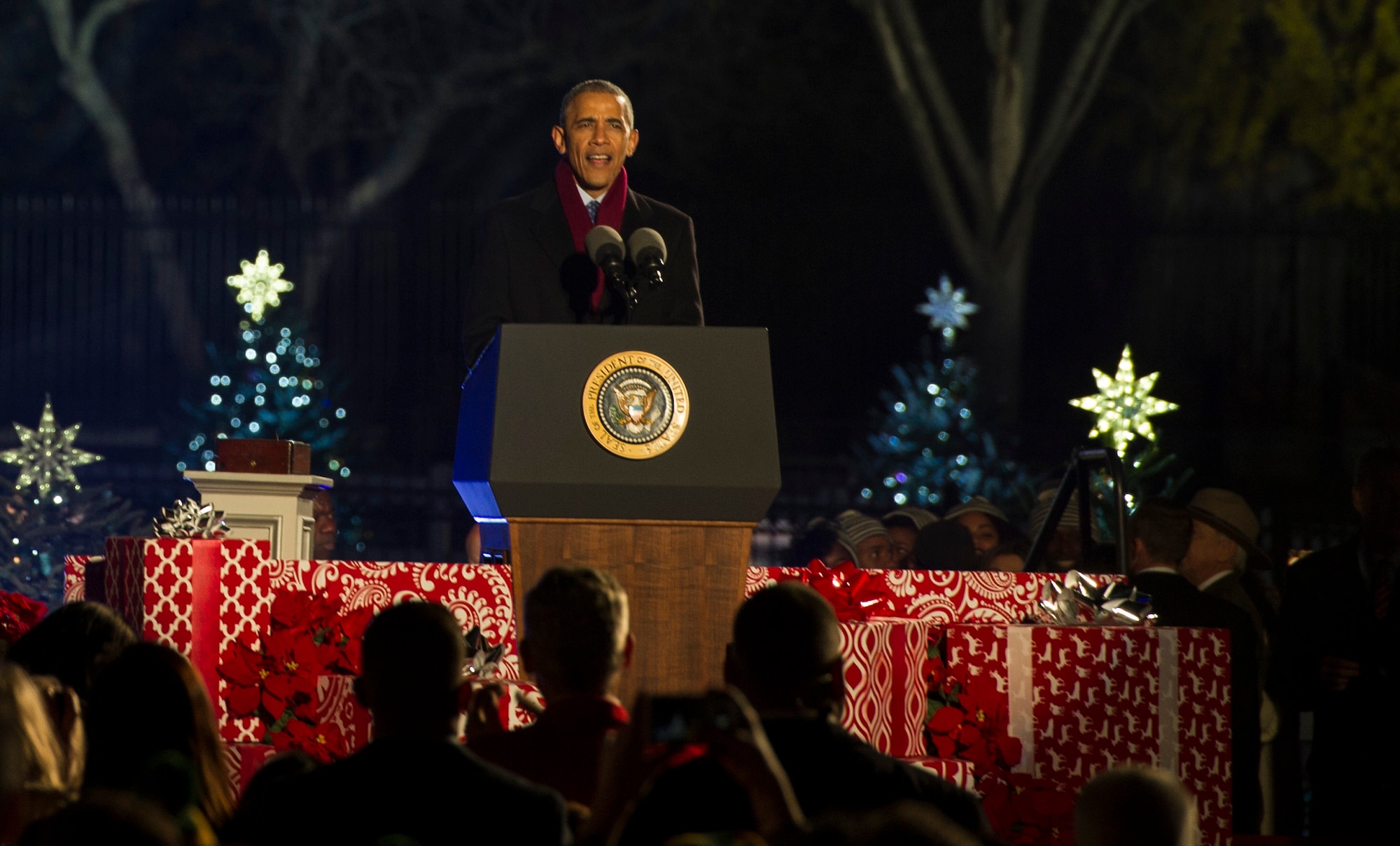 President Barack Obama speaks to eventgoers during the National Christmas Tree Lighting Ceremony in Washington D.C., Dec. 1, 2016. The annual ceremony dates back to 1923 during the Coolidge Administration and has continued since. (U.S. Air Force photo by Senior Airman Jordyn Fetter)