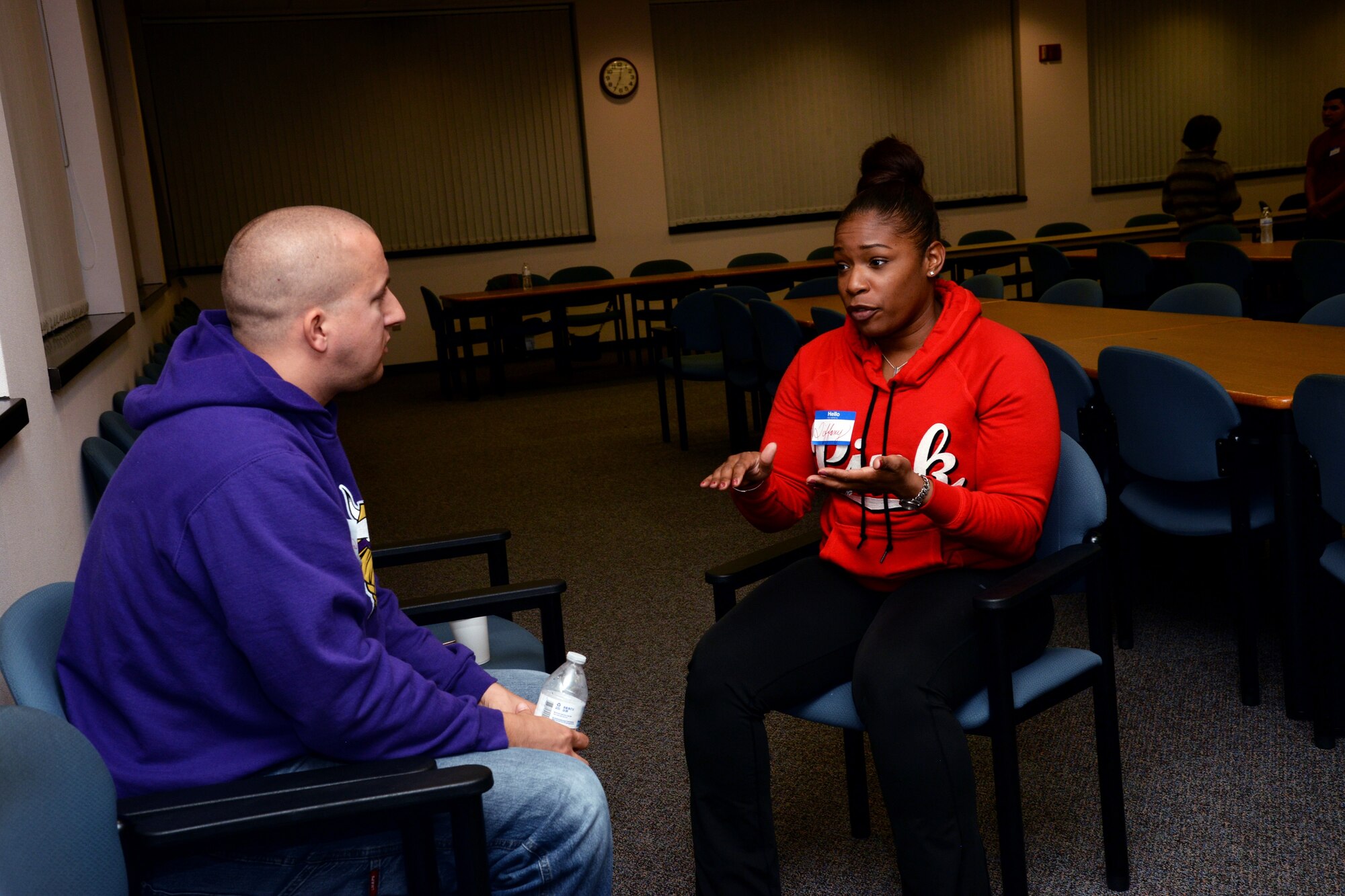 Master Sgt. Tiffany Jones, Senior Noncommissioned Officer Academy student, sits down and speaks with SSgt. Garrett Watson, 42nd Security Forces Military Working Dog trainer, during a Straight Talk Mentoring event, Dec. 1, 2016 at Maxwell Air Force Base Gunter Annex, Ala. Airmen ranging from the ranks of airman basic through staff sergeant were invited to the quarterly Straight Talk Mentoring event held at the SNCOA Library to have group and one-on-one discussions with SNCOs from bases and career fields across the Air Force. (U.S. Air Force photo/Senior Airman Alexa Culbert)