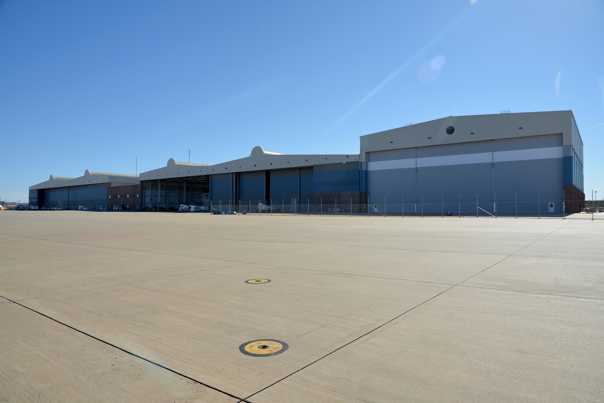 An overall view of the new Navy hangar, far right, which features its own machine shop, sheet metal shop and new offices for engineers, logisticians and key personnel of the Fleet Support Team. (Navy photo by Petty Officer 1st Class Cody Boyd)