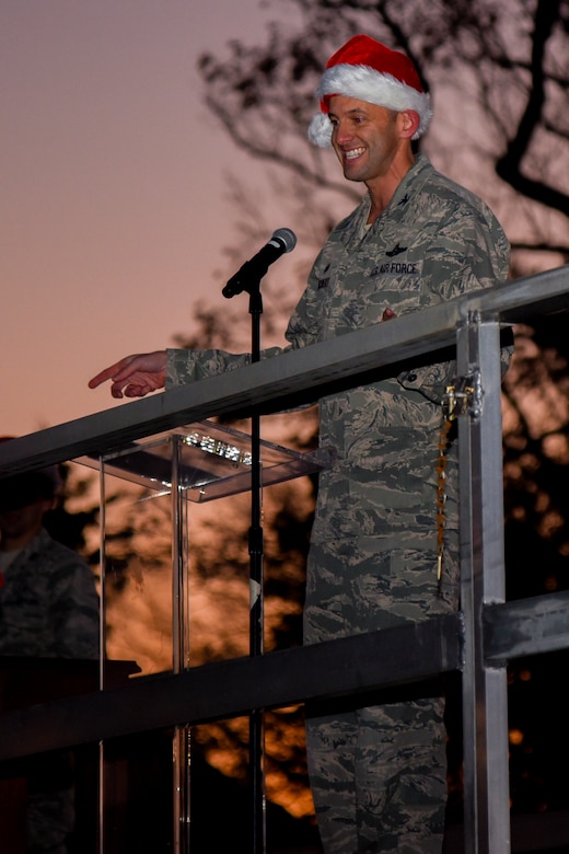 Col. E. John Teichert, 11th Wing and Joint Base Andrews commander, speaks at the Christmas tree lighting on JBA, Md., Dec. 1, 2016. The lighting ceremony kicks off the holiday season and helps foster a sense of community on base. (U.S. Air Force photo by Airman 1st Class Valentina Lopez)