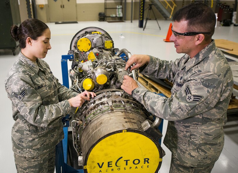 919th Special Operations Maintenance Group Airmen work on a C-146 engine at Duke Field, Fla.  (U.S. Air Force photo/Tech. Sgt. Sam King)